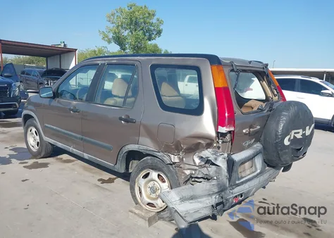 2004 Honda Cr-V Lx z USA, uszkodzony, nr VIN JHLRD68574C006688